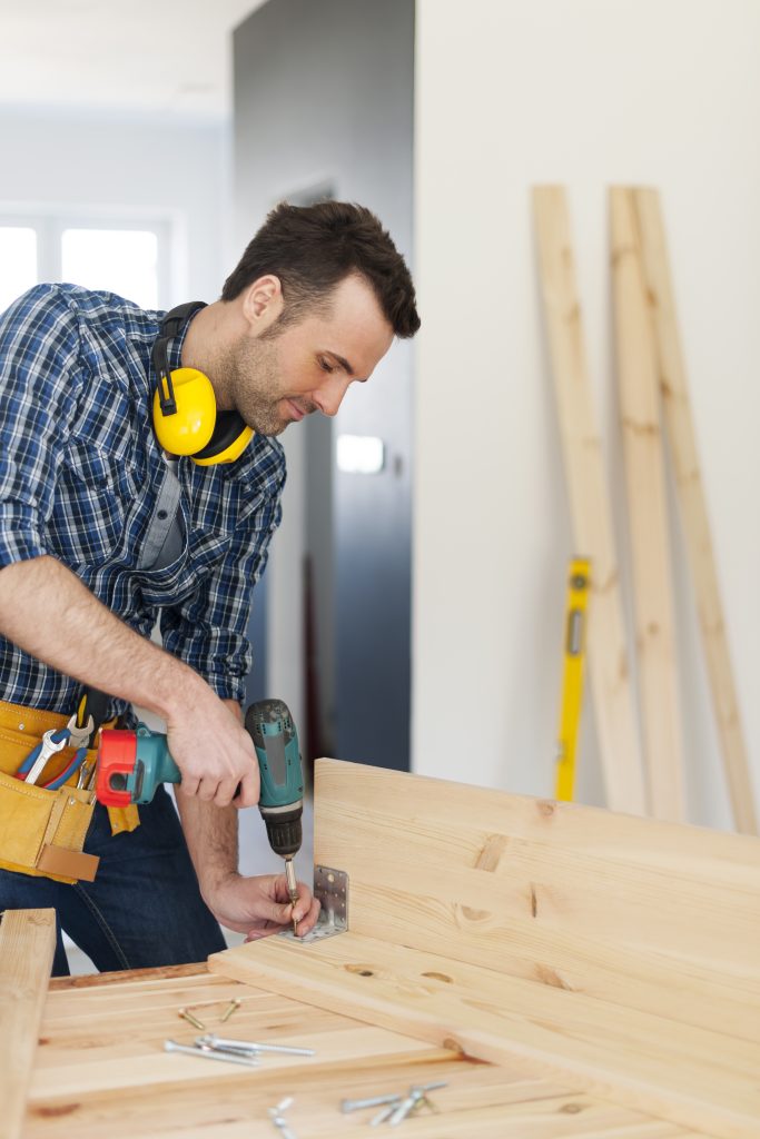 carpenter creating new furniture