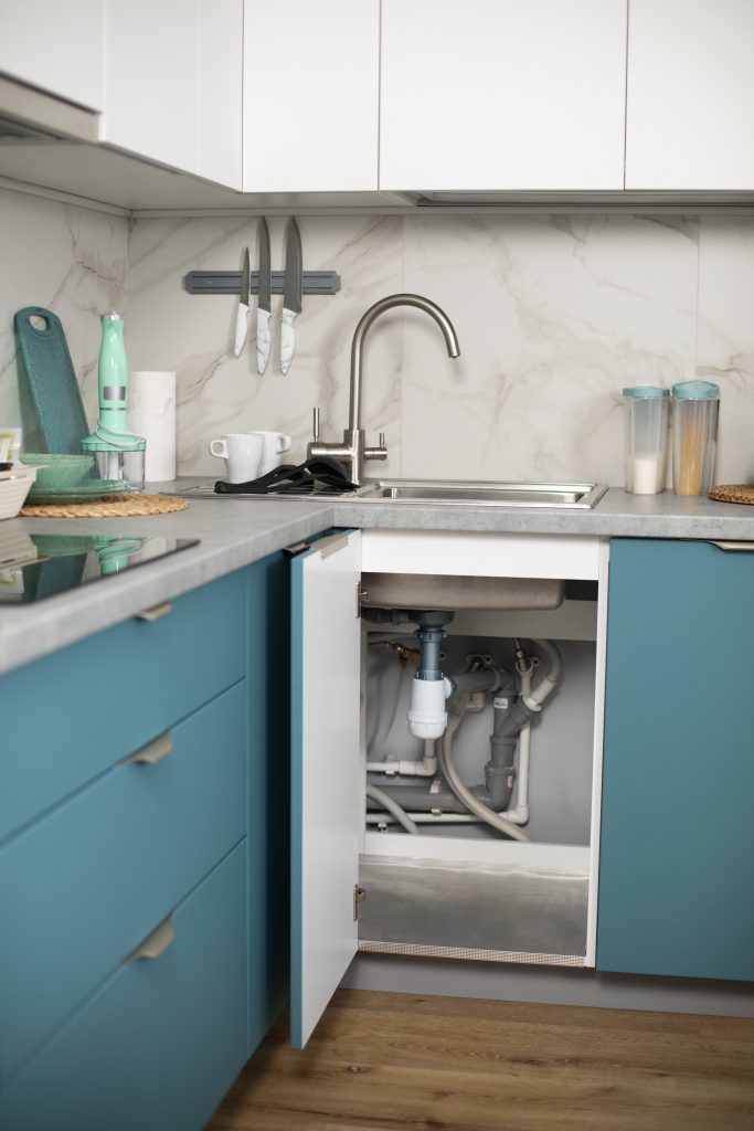 view exposed plumbing pipes kitchen